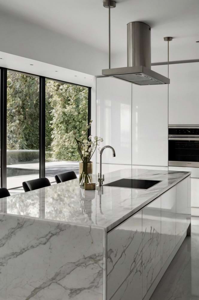 Minimal kitchen stone countertop with wood accents