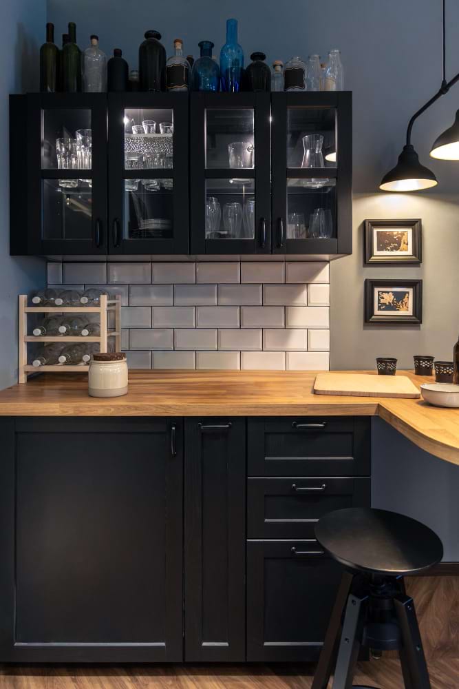 kitchen wooden countertop black cabinet